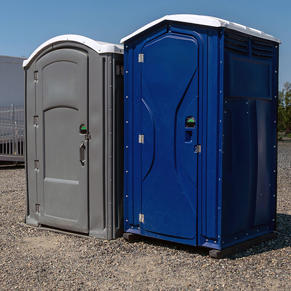 two porta potties side by side